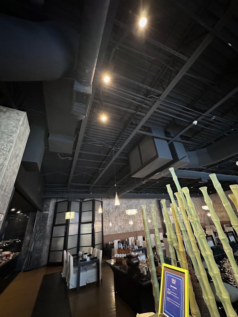 Commercial HVAC supply ductwork in an open-ceiling restaurant – Alltech HVAC